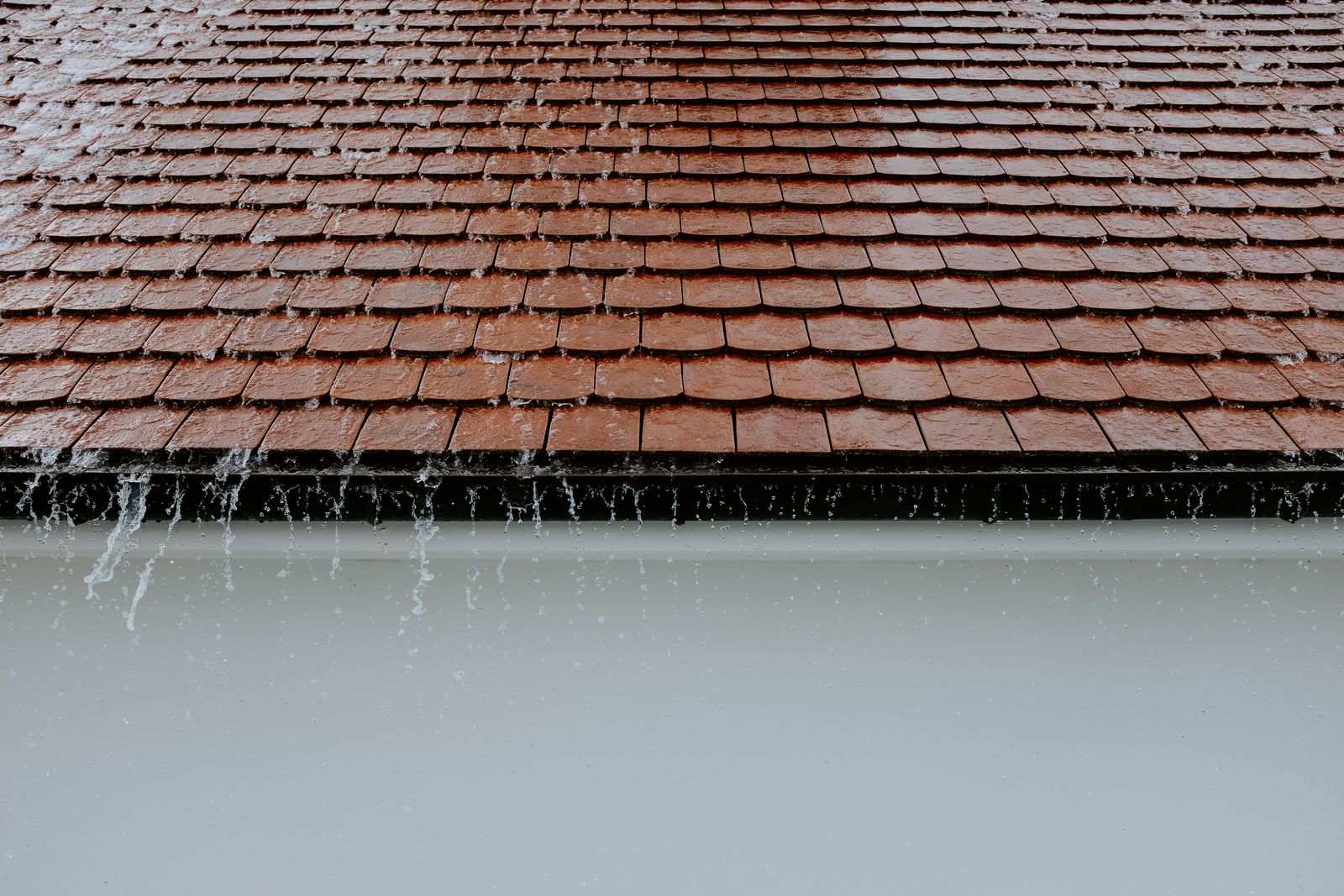 Gutter cleaning in progress