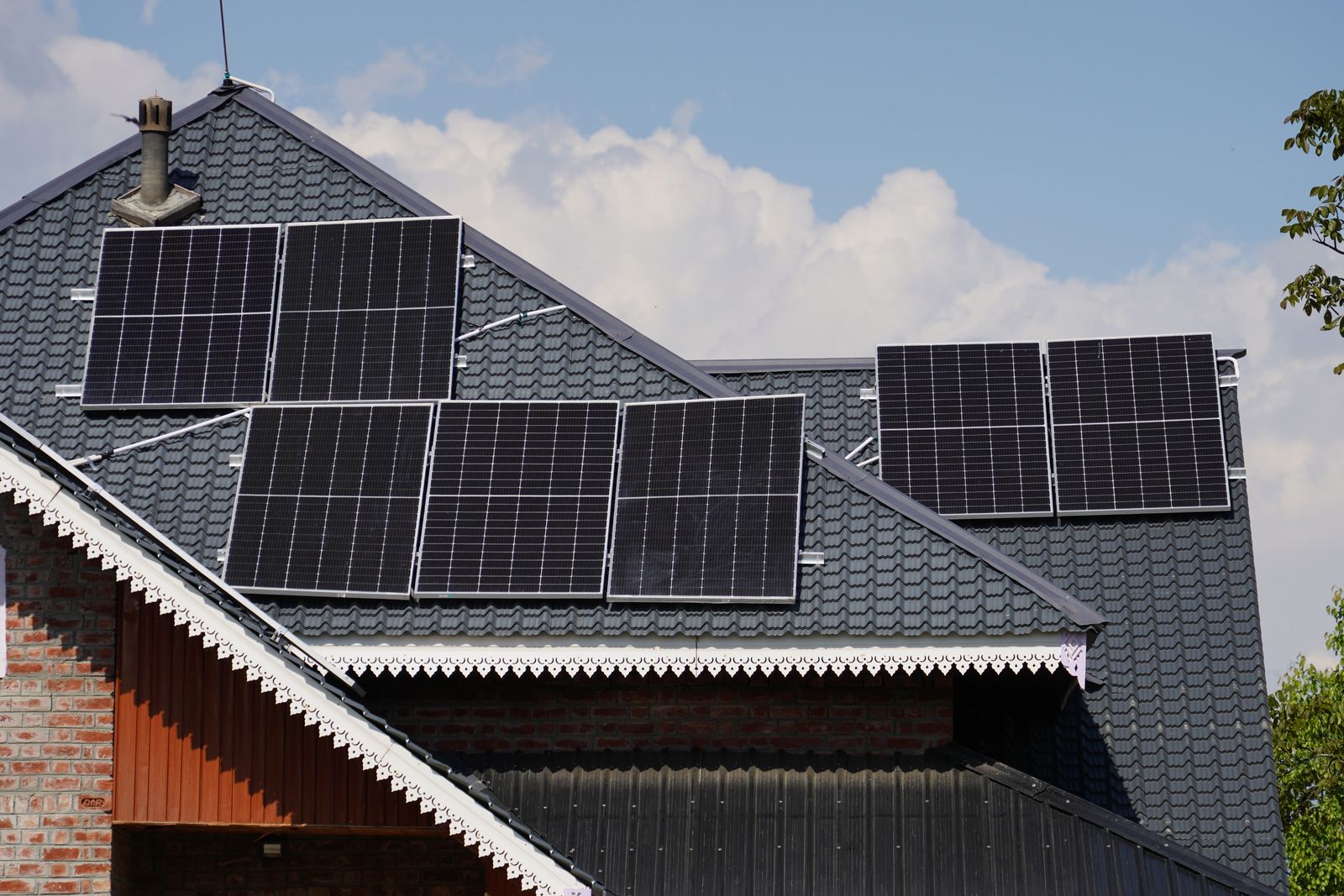 Rooftop solar modules against a clear sky